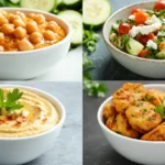 🥗 Recette pois chiche : Assortiment de plats méditerranéens : ragoût de pois chiches, salade fraîche, houmous crémeux et galettes de pois chiches.